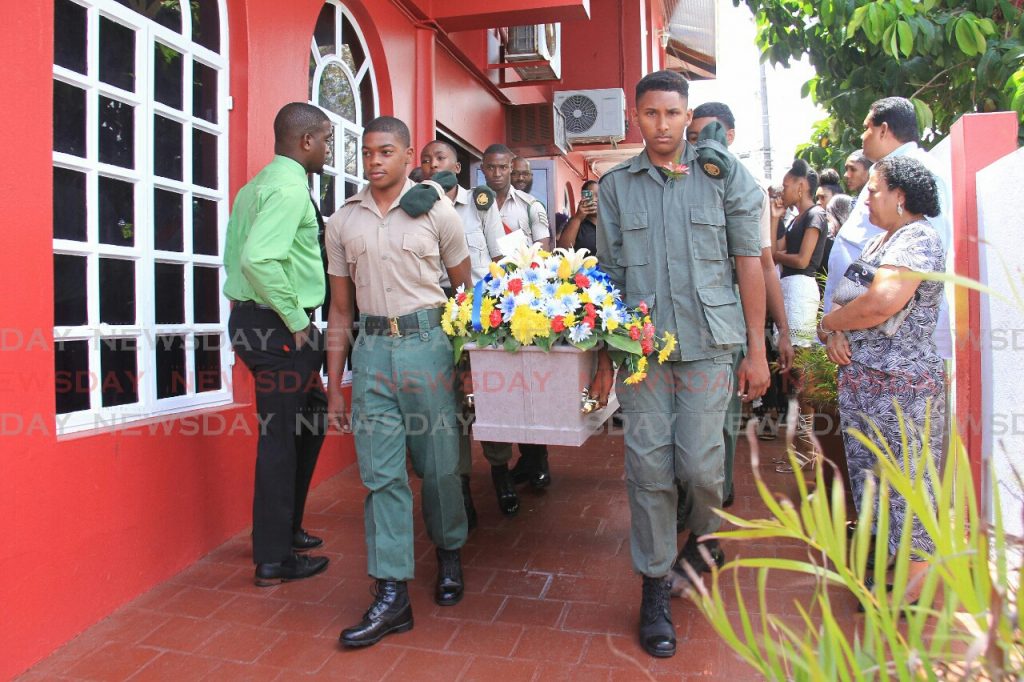 members of the TT Cadet Force carry out the body of Tyrek Richardson at K Allen and Sons Funeral Chapel, Arima.

Photo: Ayanna Kinsale