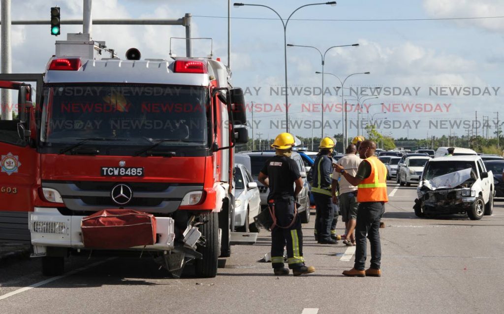 On its way to an emergency a fire truck collided with a van, right, on the Churchill Roosevelt Highway, Trincity on December 23, 2018. FILE PHOTO 