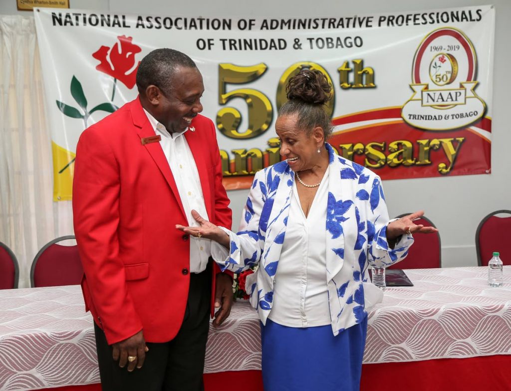 National Association of Administrative Professionals of Trinidad and Tobago (NAAPTT) founder Grace Talma talks to president Clayton Blackman at the NAPTT media launch 2019 & 50th anniversary celebration at the NAAPTT building, in Woodbrook, Port of Spain on March 13. PHOTO BY JEFF K MAYERS
