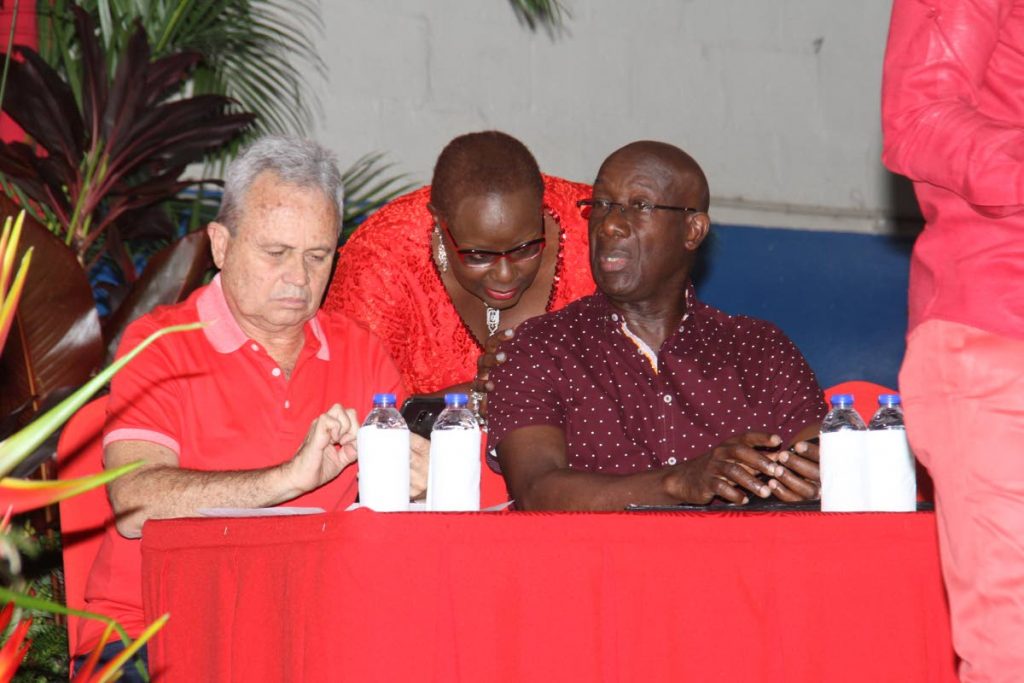 PNM chairman and Finance Minister Colm Imbert, Planning and Development Minister Camille Robinson-Regis and Prime Minister Dr Keith Rowley during a PNM meeting at Barataria South Secondary School on April 16. Imbert and a PNM team will meet the EBC this week to discuss local government and general elections. FILE PHOTO