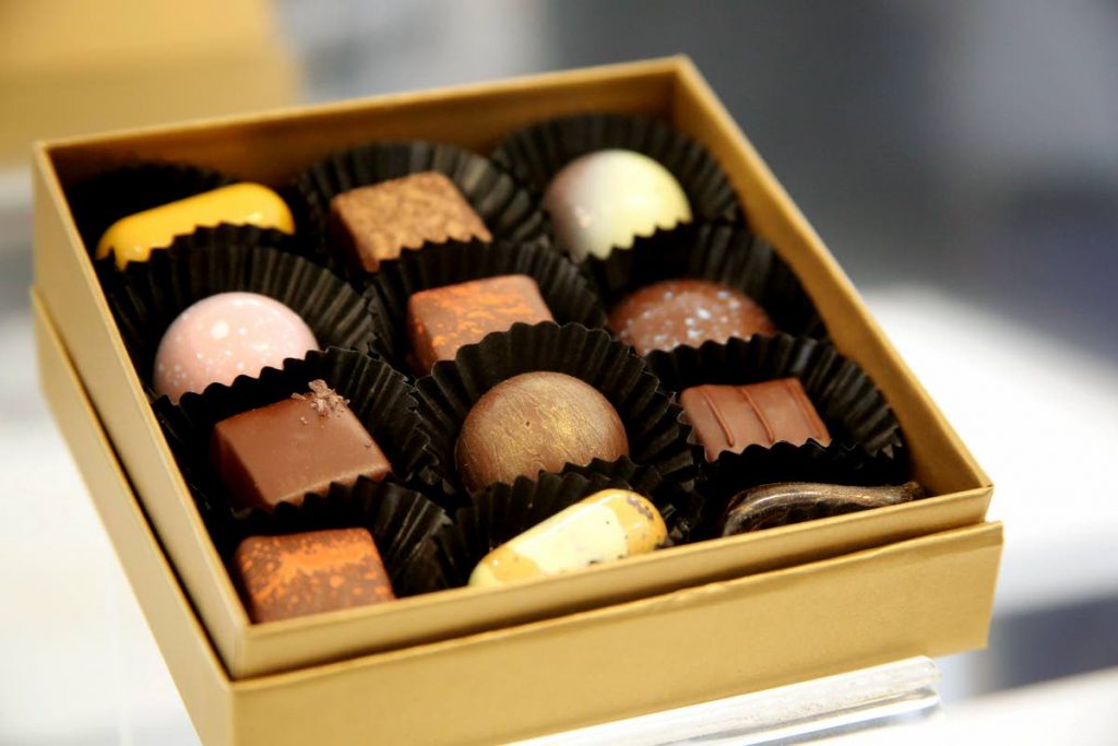 A box of fine chocolates.↔