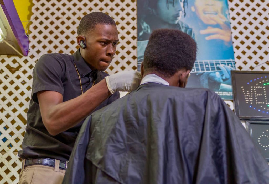 Tobago teenage Javanne Williams is in demand for his haircuts.