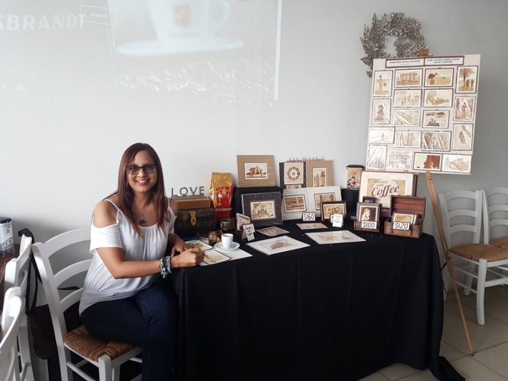 Neala Luna's coffee paintings will be one of the displays at  the Little Carib Theatre's pop-up market. 
