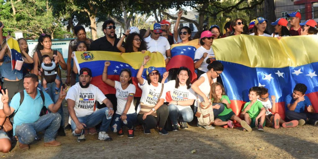 File photo: Venezuelans living in TT stage a rally ealier this month near their home embassy in support of Venezuela’s National Assembly president Juan Guaido. 