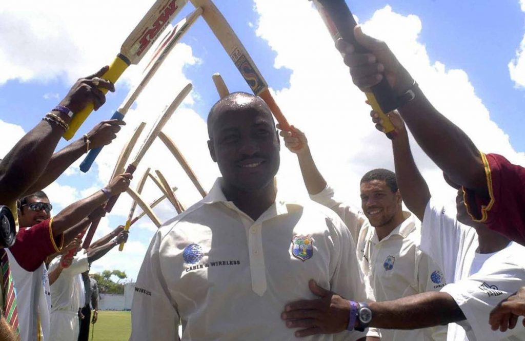 THE BEST: Brian Lara gets a guard of honour from his West Indian teammates. 