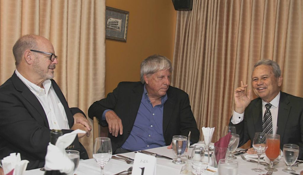  Finance Minister Colm Imbert, right, with Trinidad Union Club management committee members Brett Hobday and Kevin Kenny, centre, at a luncheon hosted by the club yesterday at the Kapok Hotel in Port of Spain. 