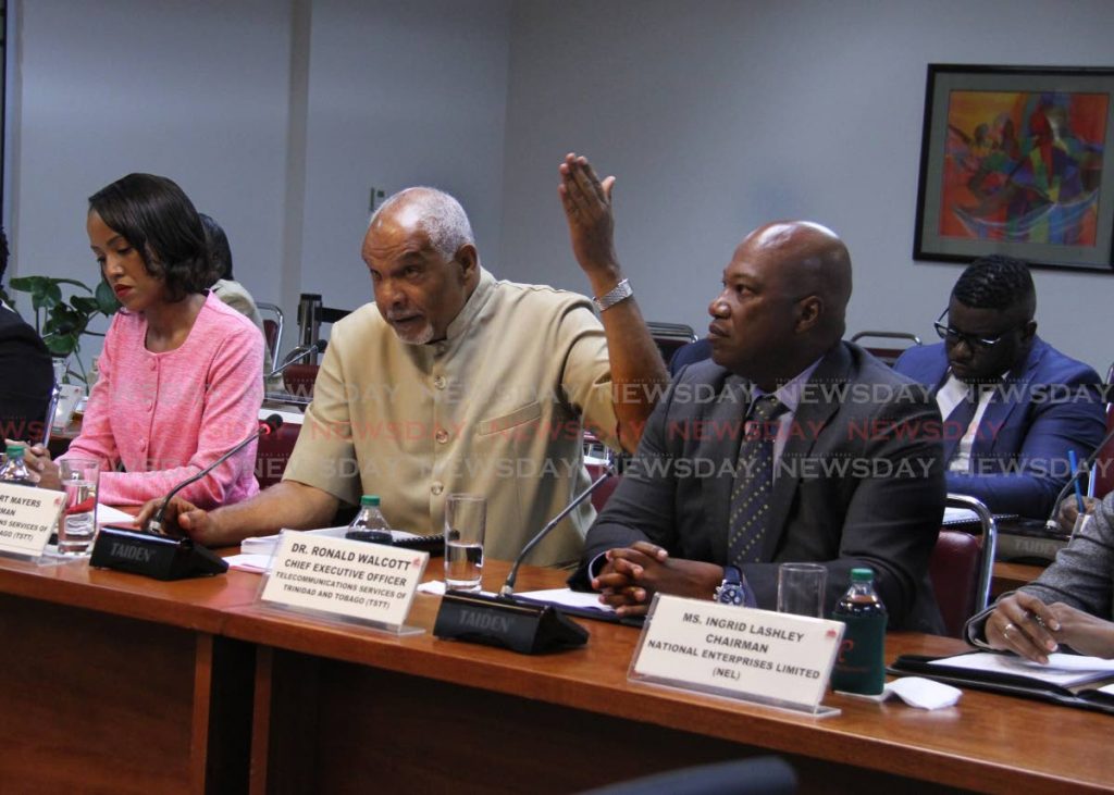 Chairman of Telecommunications Services of Trinidad and Tobago (TSTT) Robert Mayers, centre, speak at the Joint Select Committee (JSC) appointerd to inquire into and report to Parliament on state enterprises at the A.N.R Robinson Room, Tower D International Waterfront Complex, Port-of-Spain, yesterday. Photo by Ayanna Kinsale.  