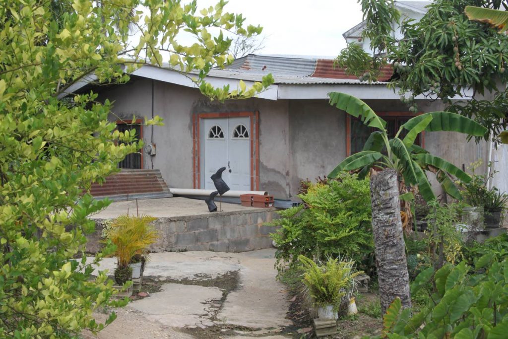 The house at Espinozar Ave, Enterprise, Chaguanas where a 62-year-old woman and her two sons were chopped and beaten during a home invasion on Monday.