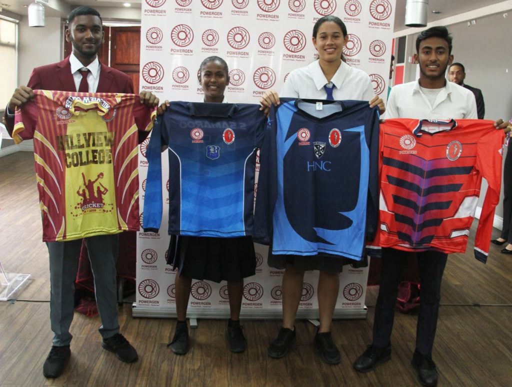 (From left to right) Captains Navin Bidaisee of Hillview College, Shalini Samaroo of Barrackpore East Secondary School, Jesse Furdinand of Holy Name Convent and Darius Gopaul of Presentation College hold their jerseys at the Secondary Schools’ Cricket League press conference, which was held at the Hasely Crawford Stadium, VIP Lounge yesterday. 