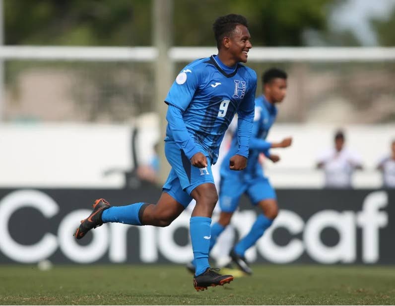 Honduras’ Jeffry Miranda (background) scored a hat-trick yesterday against TT, at the Concacaf U17 Championships, held at the IMG Academy, Bradenton, Fl.