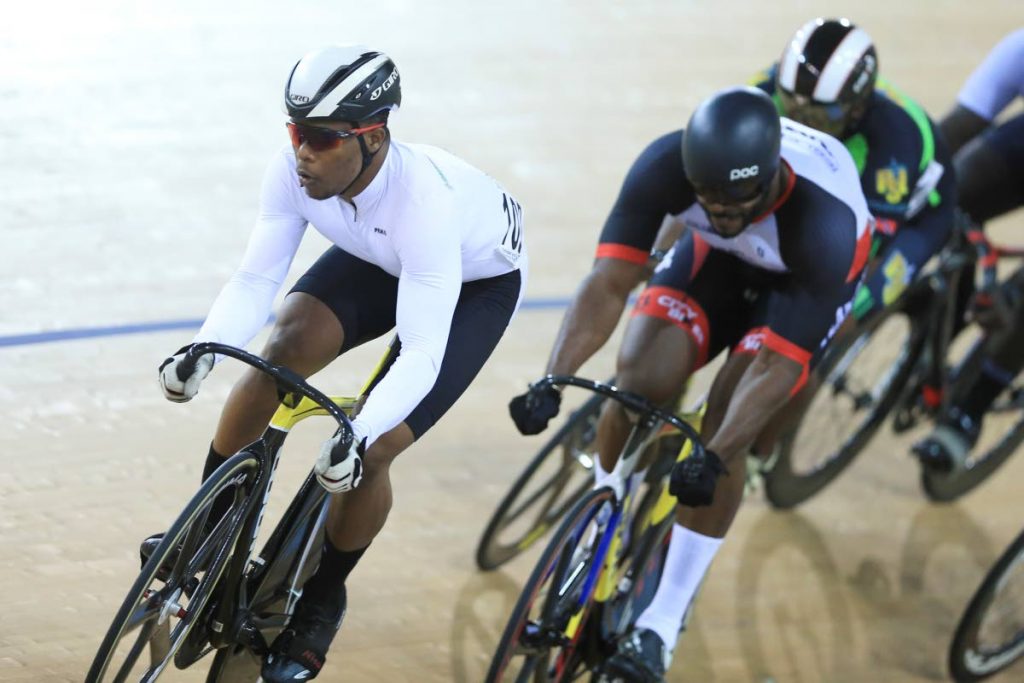 2019.05.09: Winner of the Karren Nicholas Paul leads ahead of 2nd place Quincy Alexander, during Cycling in the National Velodrome, Couva. Photo: Allan V. Crane/CA-images