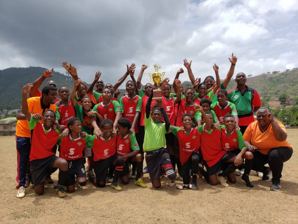 Jabloteh U-13 players, coaches and management team celebrate their 5th straight Youth Pro League title on Saturday. 