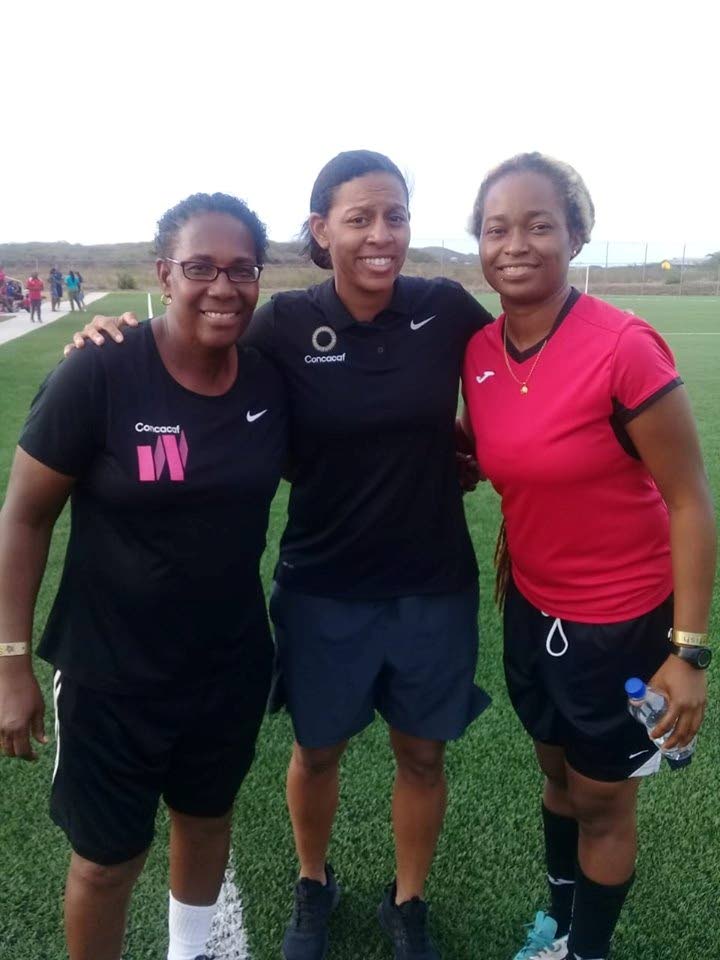 Desiree Sarjeant (left) and Dernelle Mascall (right) along with coaching instructor Candace Chapman in Antigua. 