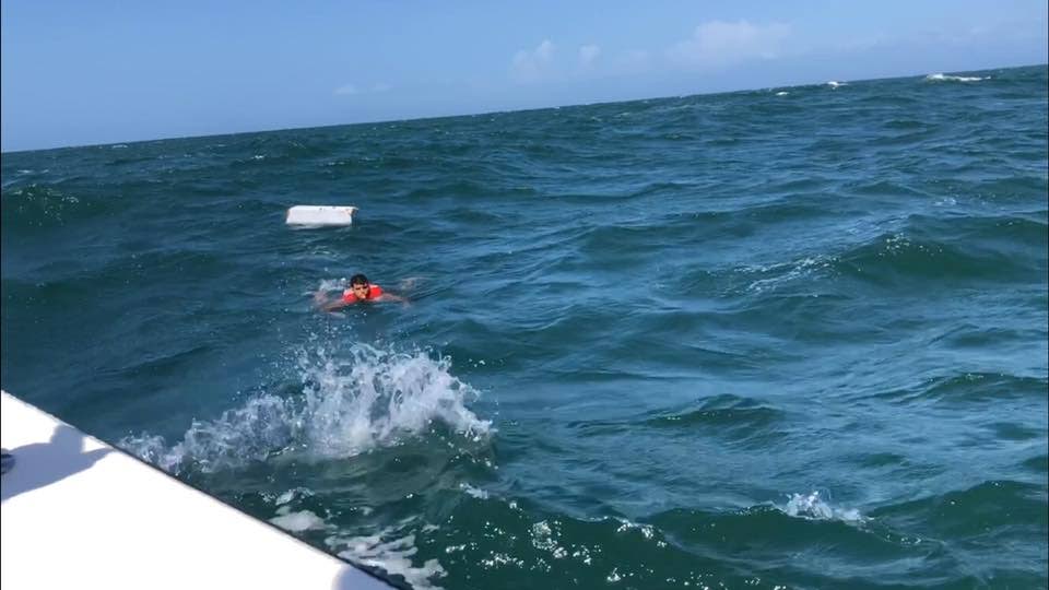 A photograph from Robert Richards' Facebook page shows a man, said to be a Venezuelan, in distress in waters off Chaguaramas.