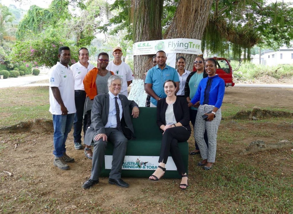 Members of the Australian High Commission, the Flying Tree Environmental Managemen, and the Diego Martin Regional Corporation pose for a group photo with the newly-installed green bench.