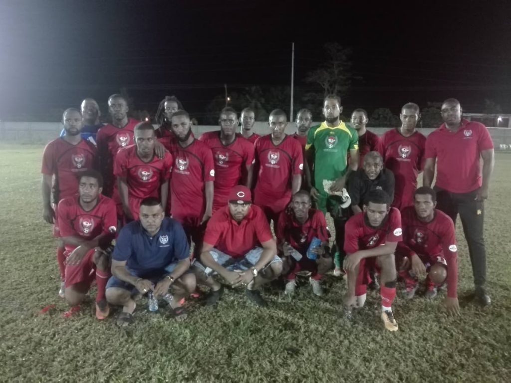 Matura ReUnited players and coaching staff after advancing to the semi-finals of the Sweet Sixteen Football League at the Ojoe Road Recreation Ground. 