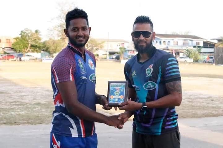 Jyd Goolie of Barrackpore United receives the man of the match award from Rayad Emrit after smashing a half century in a high scoring 13-run victory over Young Guns over the weekend in the Jaguar Land Rover and FUSO Central Super League (CSL) held at Pierre Road Grounds, Charlieville.