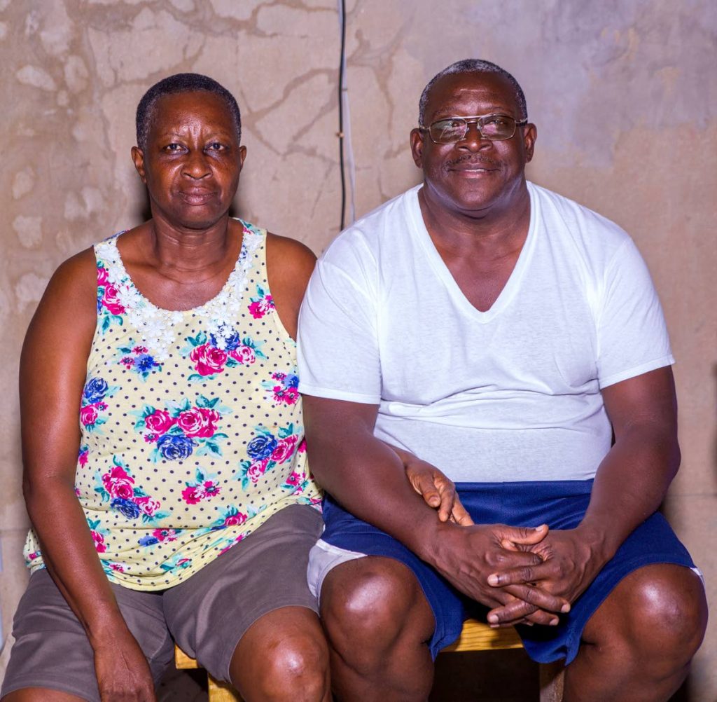 Horace Henry and his wife Beverly are uneasy as their home is situated in the zone earmarked for acquisition for the ANR Robinson International Airport expansion. PHOTO BY DAVID REID 
