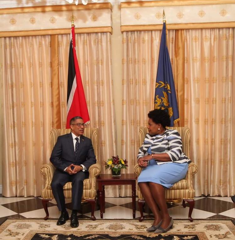 New Venezuelan ambassador Carlos Amador Perez sits near President Paula-Mae Weekes after presenting his credentials to her today. Photo courtesy Office of the President.