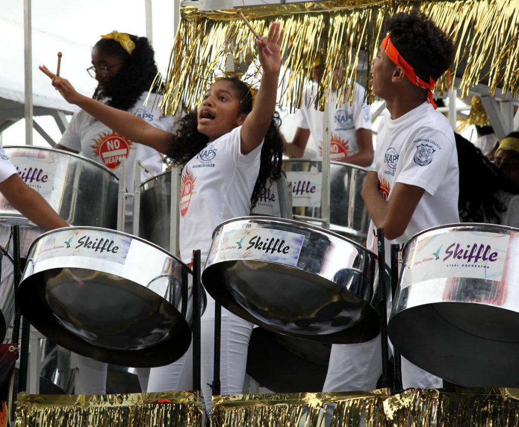 Naparima Combined Steel Orchestra, comprising students of Naparima College and Naparima Girls High School, during their winning performance of the secondary schools Panorama final at Queen's Park Savannah, Port of Spain on February 24. Although more young people play pan today, few of them attend Panorama as spectators. PHOTO BY ROGER JACOB