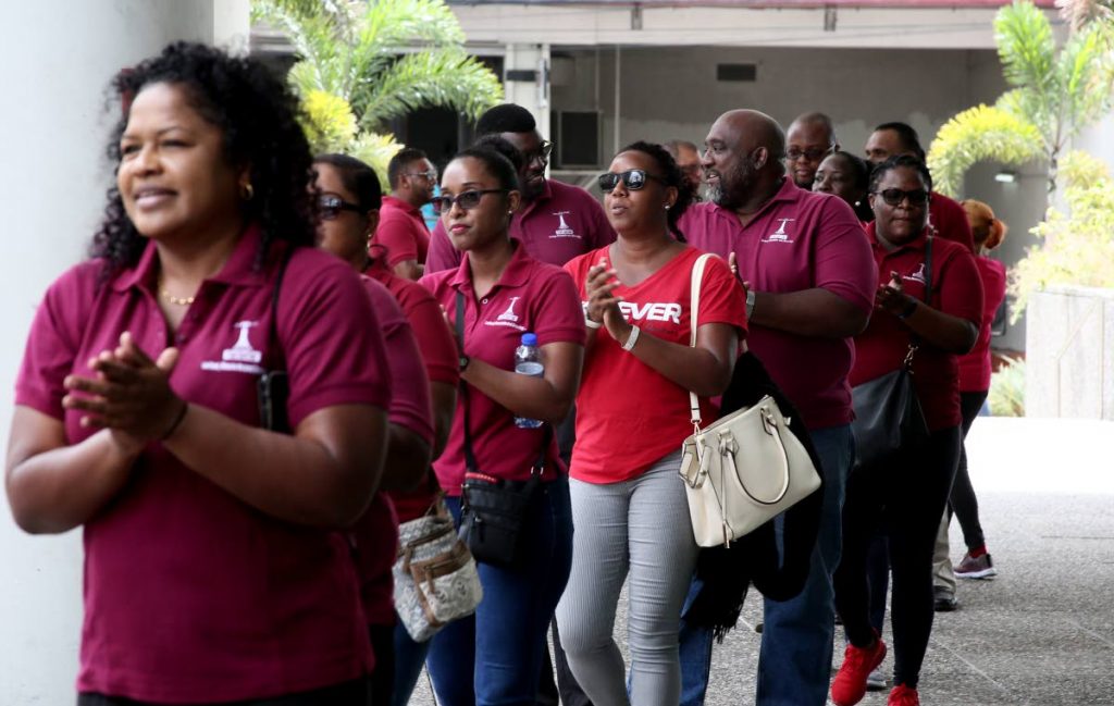 TTUTA members protest outside the Education Ministry in Port of Spain on May 3, 2018 over their upgrade status. The teachers union says salary negotiations have stalled since 2015 and plan to protest on July 3. FILE PHOTO