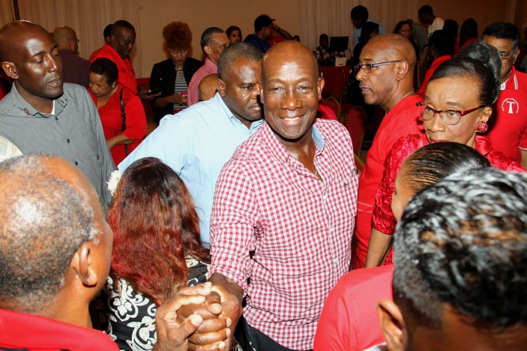 In this May 8, 2019 file photo, Dr Keith Rowley greets members of the audience gathered for a political meeting hosted by the ruling People's National Movement at Signature Hall, Chaguanas.