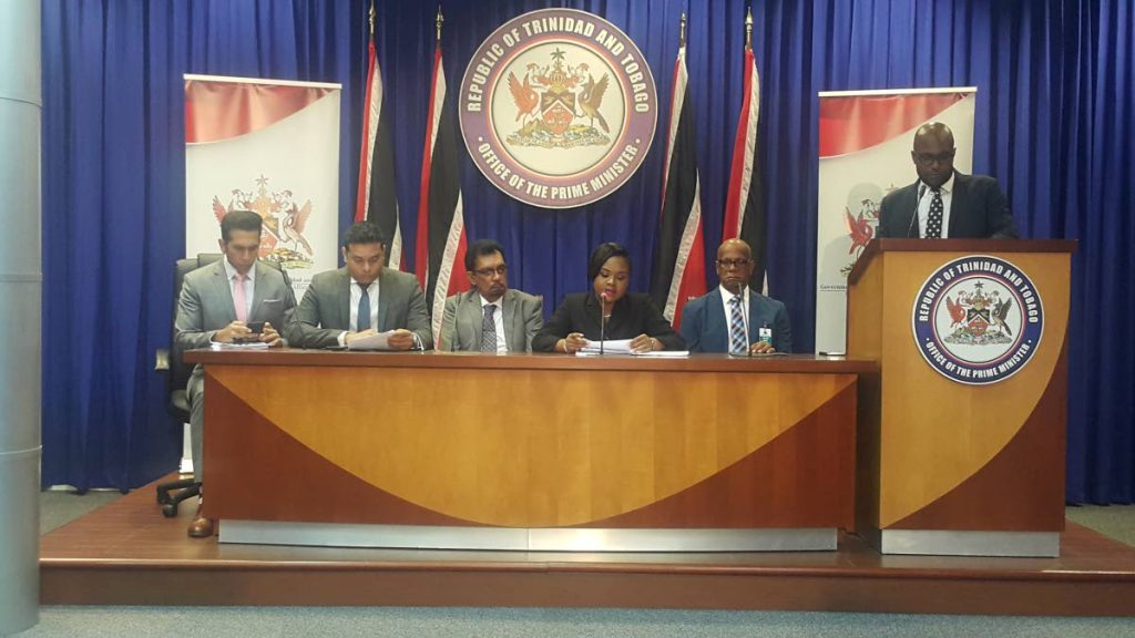 Minister of Sport and Youth Affairs Shamfa Cudjoe ( 3rd from right) addresses a press conference yesterday, at the Office of the Prime Minister, St Clair, on plans to upgrade Skinner Park, San Fernando, which will begin on June 17. Also in attendance were, (left to right) Attorney General Faris Al-Rawi, Minister of Toursim and San Fernando east MP Randall Mitchell, Local Government Minister Kazim Hosein and Mayor of San Fernando Junia Regrello.