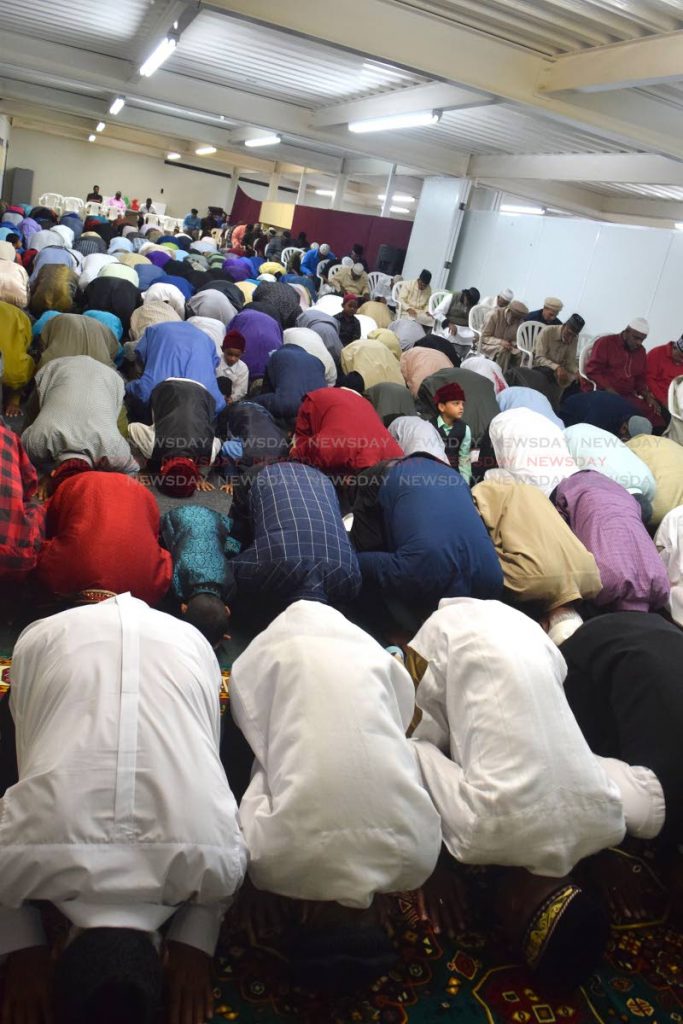 Muslim men pray at the Ahmadiyya Muslim Community Mosque in Preysal PHOTO BY VIDYA THURAB
