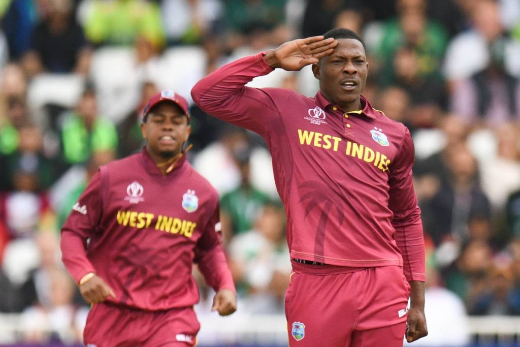 Sheldon Cottrell, right, celebrates during a previous match.
