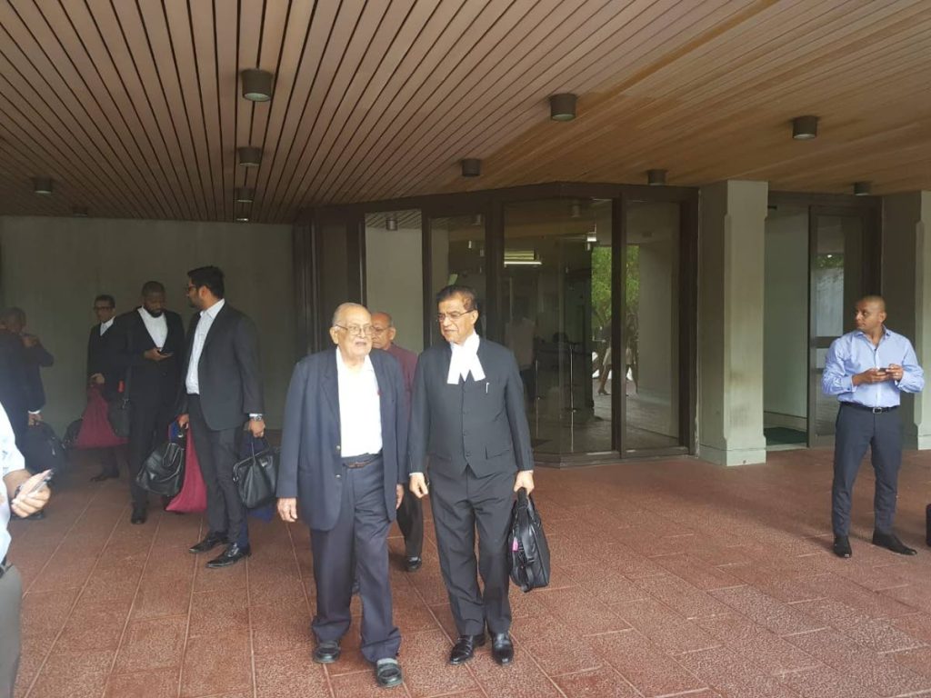 SDMS secretary general Sat Maharaj leaves the Hall of Justice, Port of Spain, with his attorney Ramesh Lawrence Maharaj,SC.