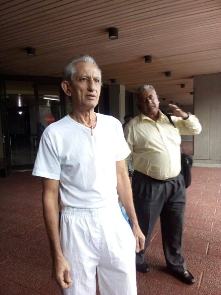 Azaad Ali and his brother Anthony Marciano leave the Hall of Justice in Port of Spain after he was ordered to be released by a High Court judge.