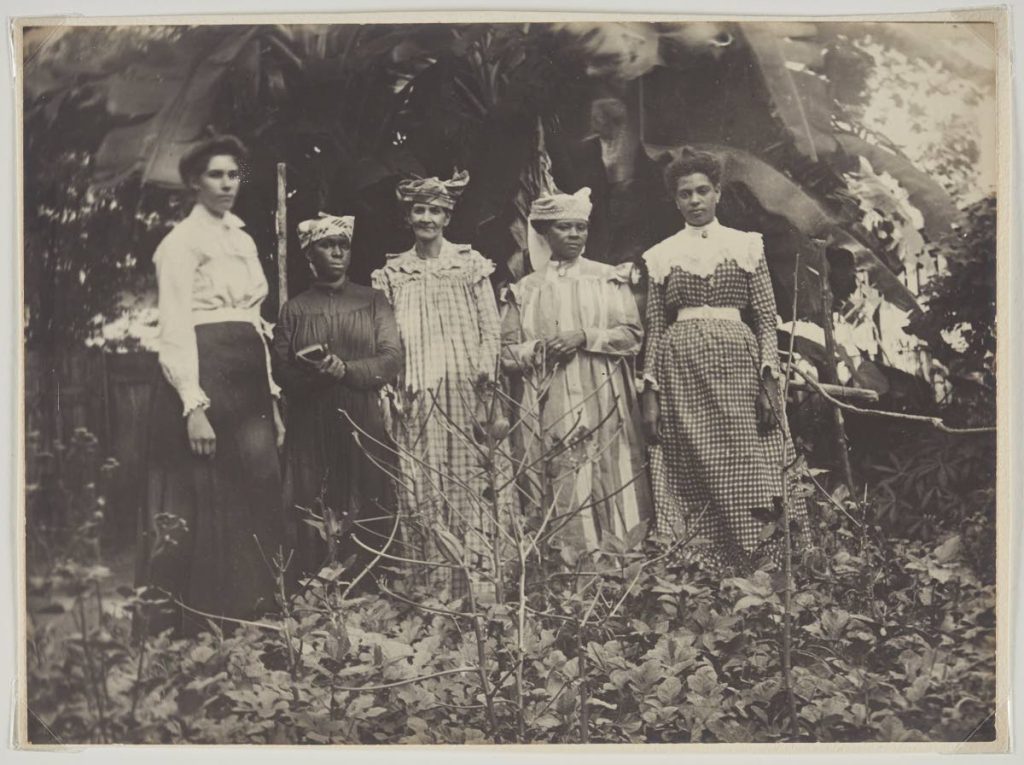 This picture of Jamaican women captured in 1900 using the photographic process of gelatin silver print. 