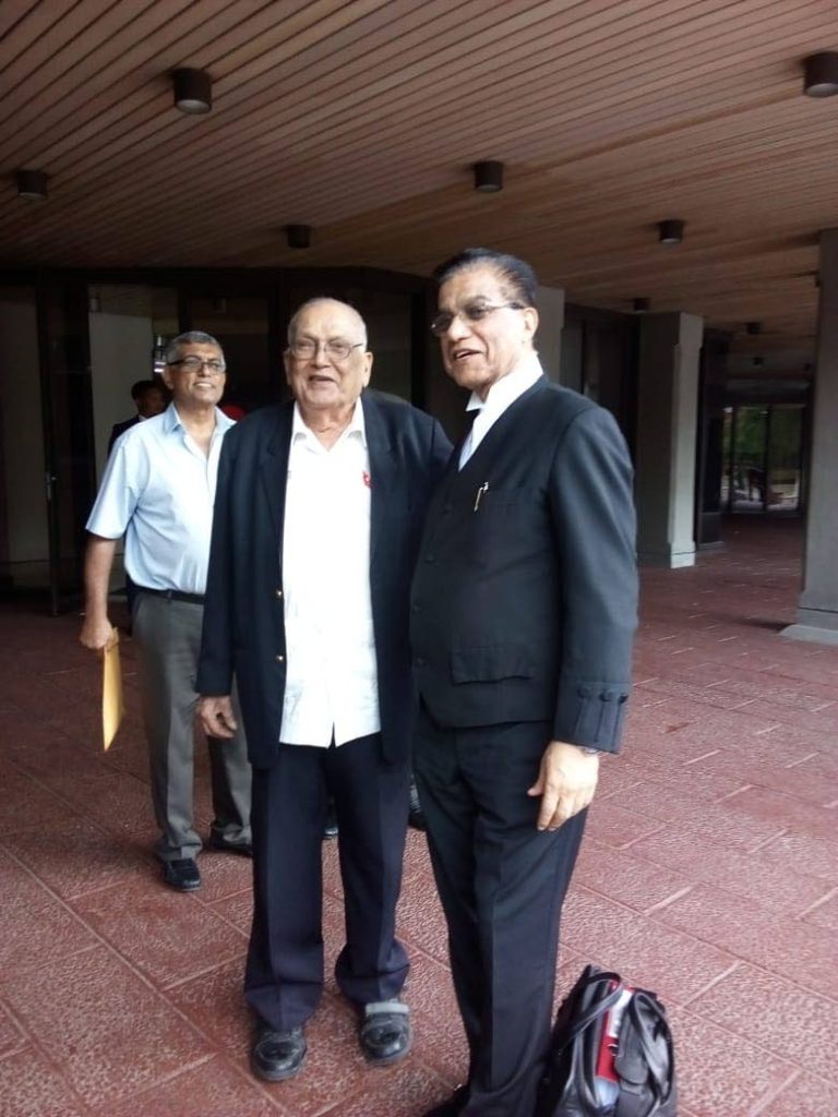 Sanatan Dharma Maha Sabha (SDMS) Satnarayan Maharaj  leader Satnarayan Maharaj and his lead counsel Ramesh Lawrence Maharaj,SC, at the Hall of Justice in Port of Spain, yesterday.