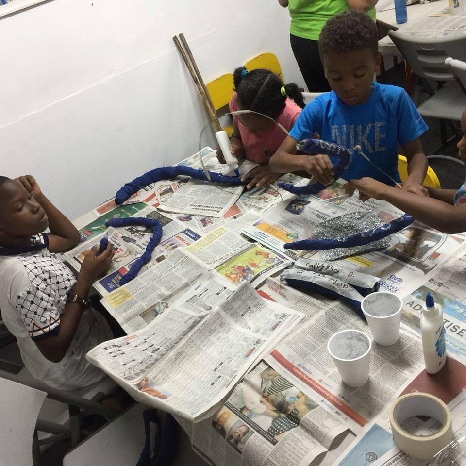 Children at the Zante Carnival and Theatre Arts Camp, which runs from July 8 to 27, learn the art of wire bending. 