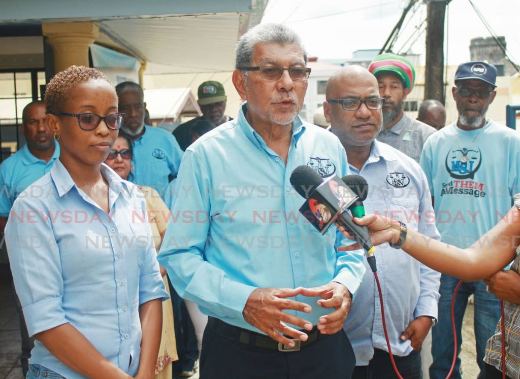 Political leader of the Movement for Social Justice (MSJ) David Abdullah speaks to media at the opening of the party's new office on Lord's Street, San Fernando, alongside Melissa Aguillera-Greig, left, and Ozzi Warwick. PHOTO BY CHEQUANA WHEELER