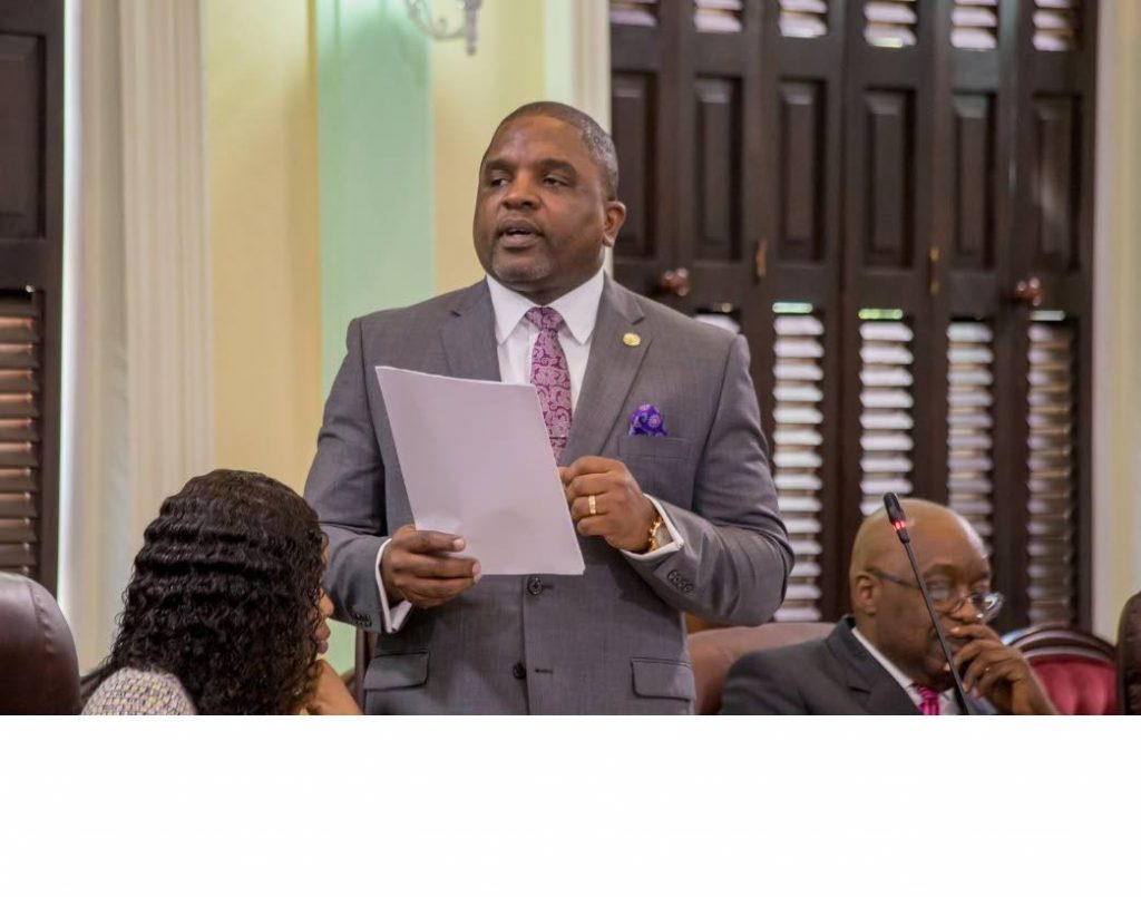 Finance Secretary Joel Jack reads the budget at the Assembly Legislature in Scarborough on Monday.  PHOTO COURTESY THE THA