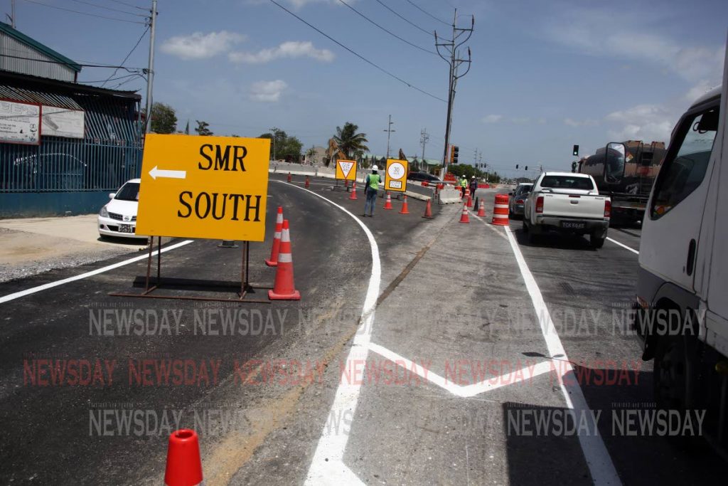 Motorists ease into the new traffic flow of the Southern Main Road in the vicinity of the Curepe Intersection, Churchill Roosevelt Highway. PHOTO SUREASH CHOLAI