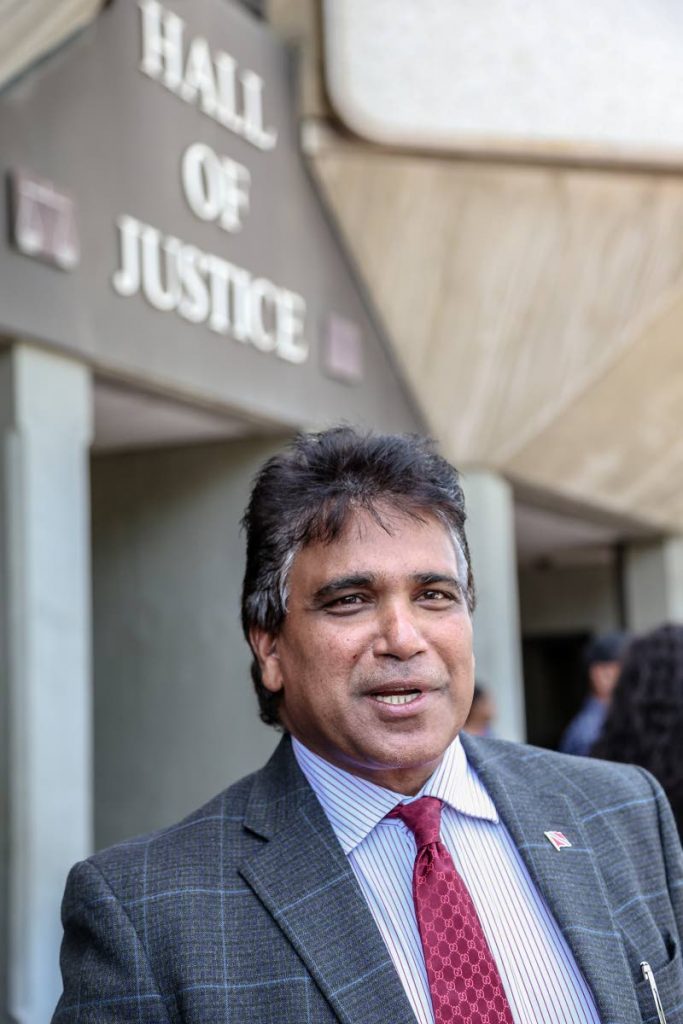 SEEKING JUSTICE: Oropouche East MP Roodal Moonilal outside the Hall of Justice in Port of Spain yesterday. PHOTO BY JEFF MAYERS