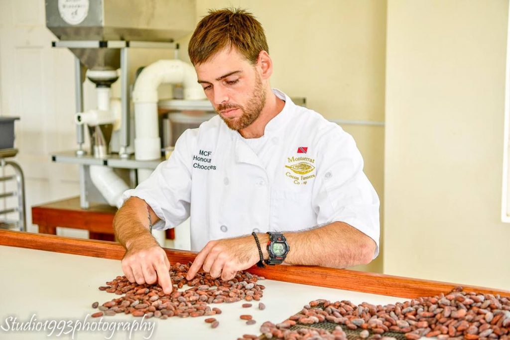 James Burns, owner of local chocolate brand JB Chocolates, is very meticulous when it comes to sorting cocoa beans. Photo courtesy JB Chocolates