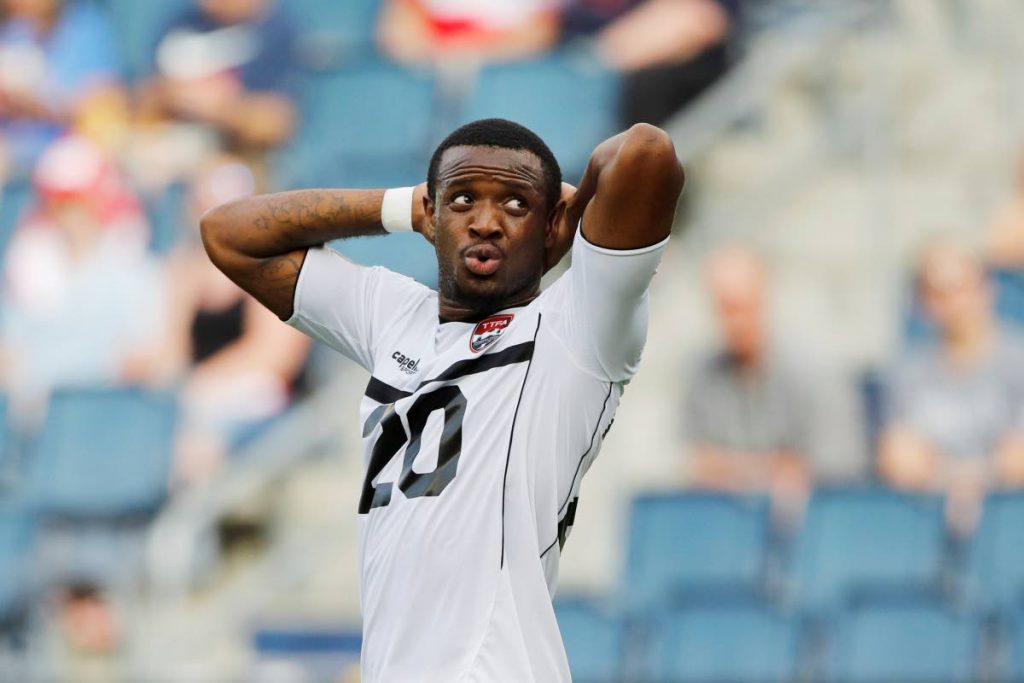 TT midfielder Jomal Williams reacts after missing a shot on goal during the first half of yesterday’s CONCACAF Gold Cup match against Guyana in Kansas City, Kansas. (AP PHOTO)