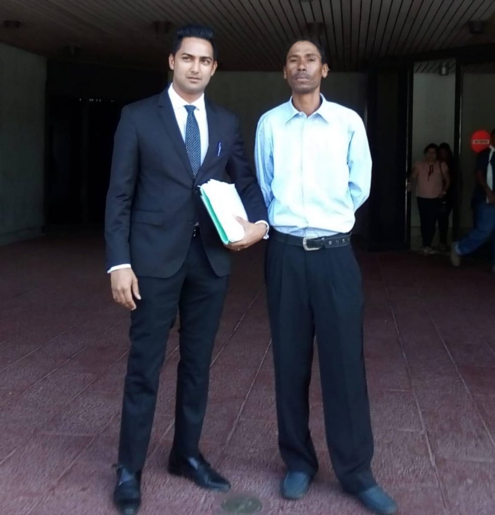 Mark Hagley, right, and his attorney Abdel Mohammed at the Hall of Justice in Port of Spain on Thursday.