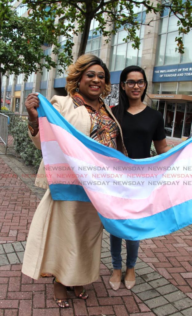 President of the Trans Alliance Brandy Rodriguez and Shannon Sirju outside parliament. PHOTO BY AYANNA KINSALE