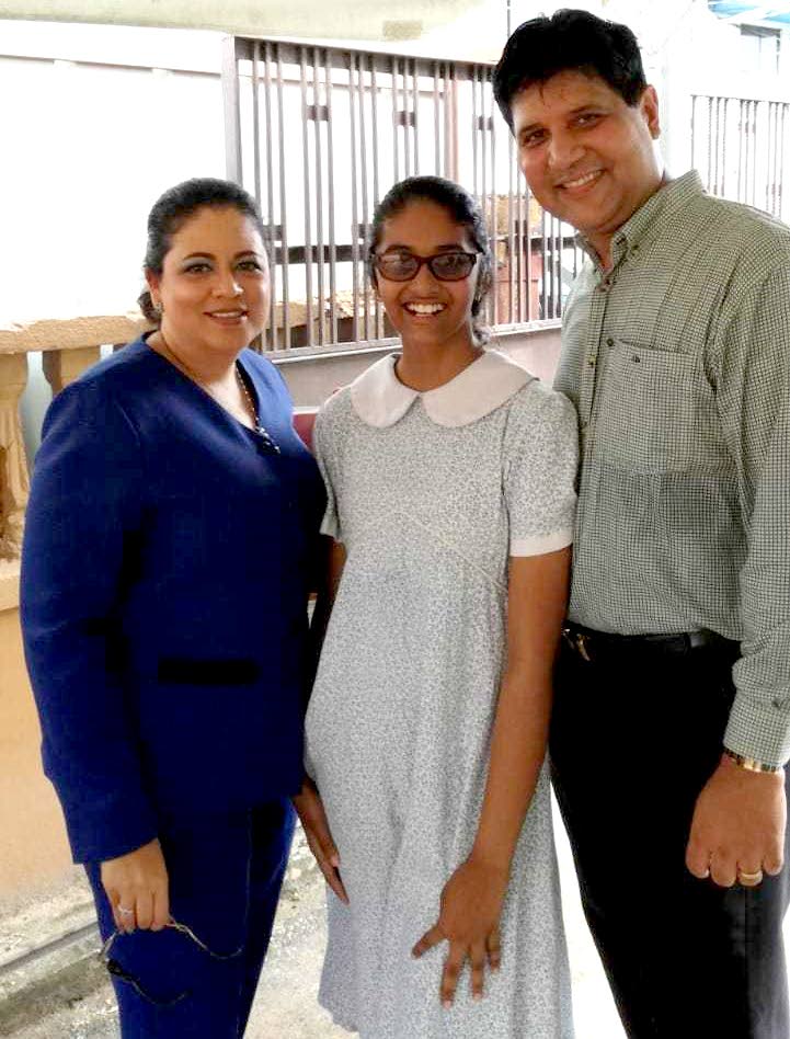 SEA SUCCESS: High Court judge Frank Seepersad with his wife Camille and their daughter Amanda, who yesterday passed for Naparima Girls’ High School. PHOTO BY AZARD ALI