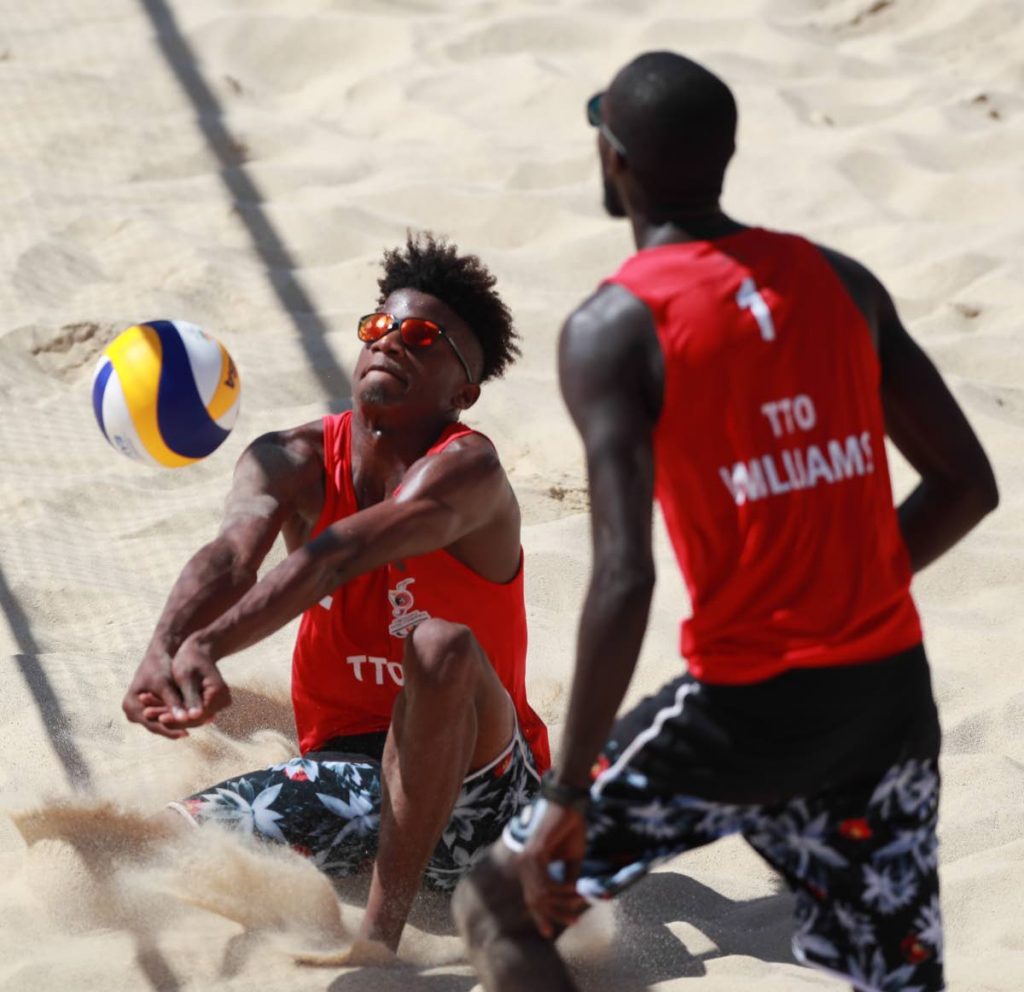  Team TTO's Men's Beach Volleyball team (Red shirt, Black shorts), Daneil Williams (#1) and Daynte Stewart (#2) Photo: Allan V. Crane