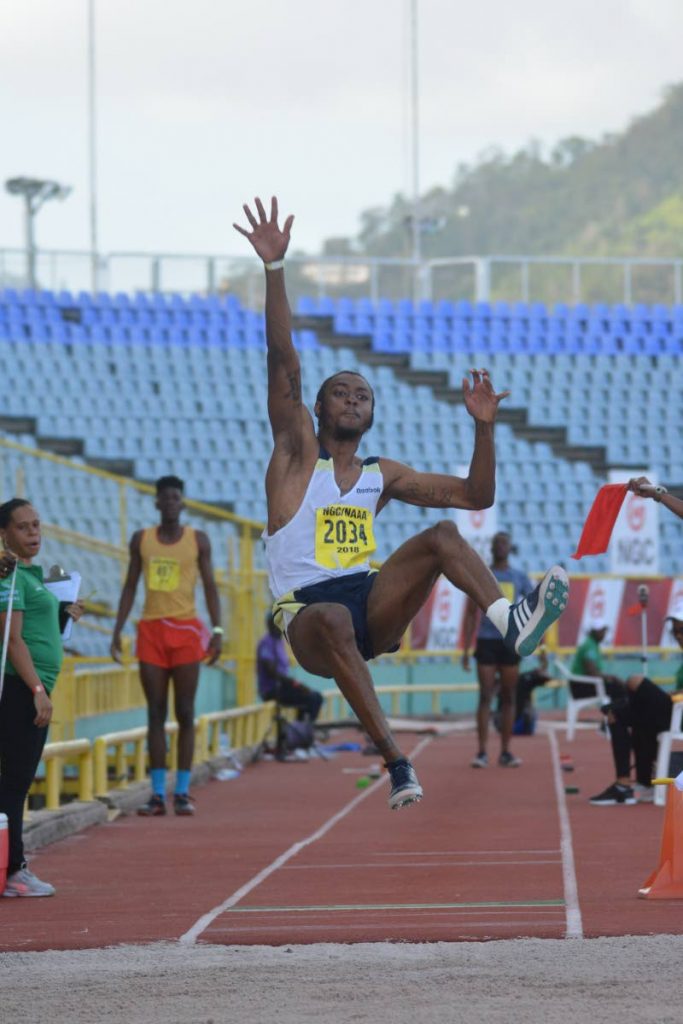 Andwuelle Wright from Signal Hill jumps his way to a new national men's long jump record at the 2018 NGC/Sagicor National Open Championships at the Hasely Crawford stadium in Port of Spain, last year. PHOTO BY ANDRE DE GANNES 