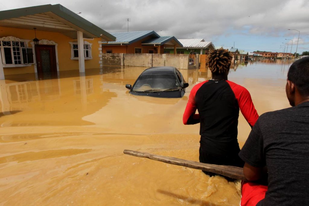Houses, vehicles and streets were submerged on October 20, 2018 as HDC’s Greenvale housing development flooded after heavy rains last year.