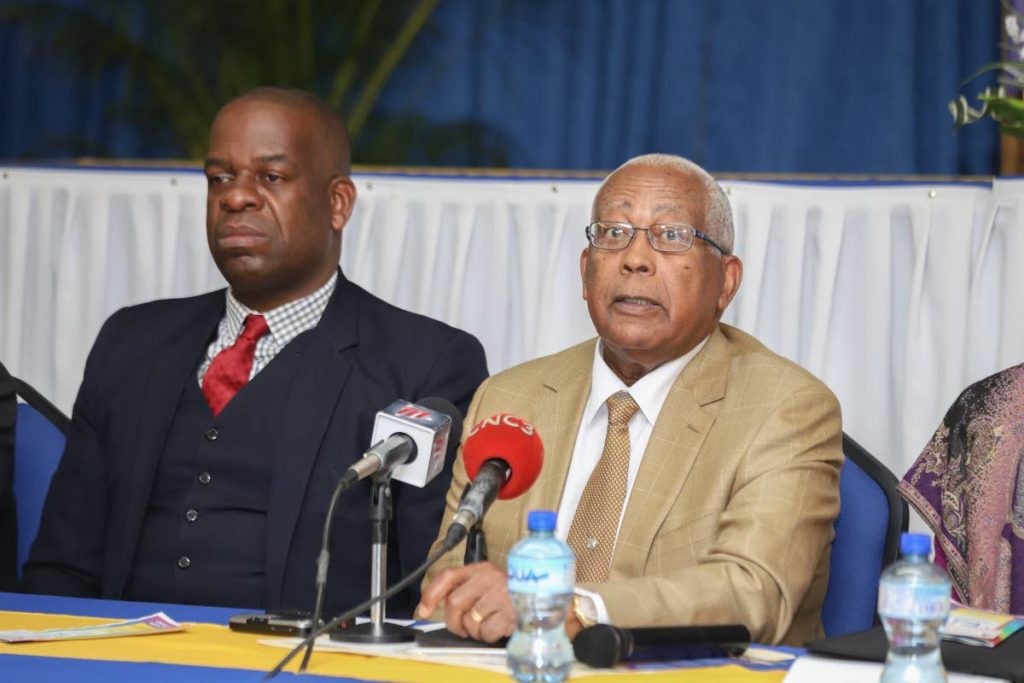 Education Minister Anthony Garcia, right, and Dr Lovell Francis, minister in the education ministry. FILE PHOTO
