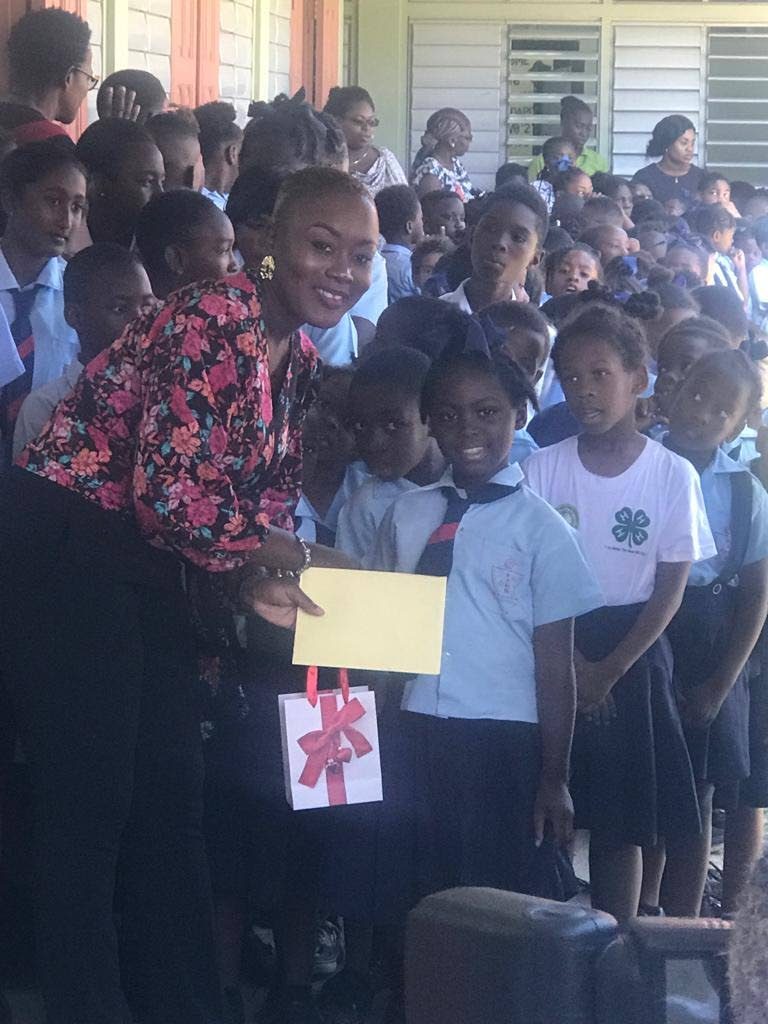 A Bon Accord Government Primary School student receives a prize in the Star Class Project 2018-2019 awards.