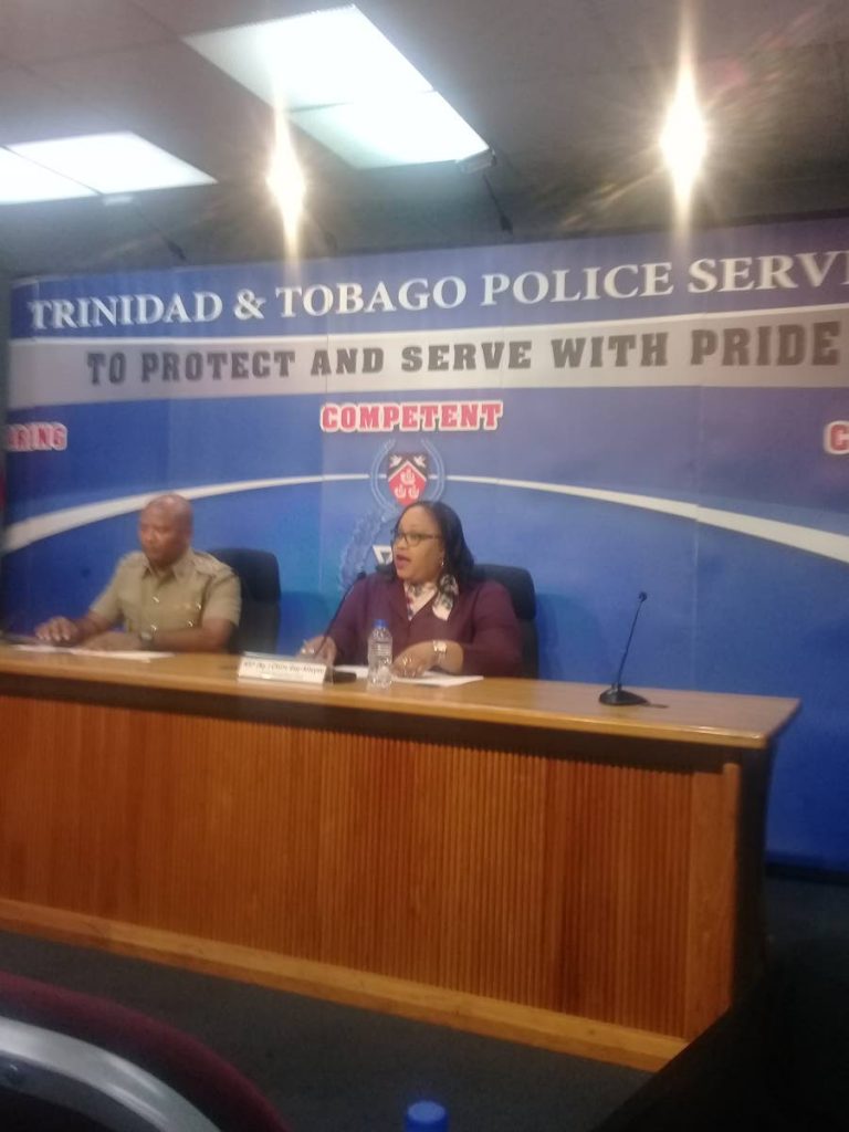 Acting Supt Wayne Mystar and Acting Assistant Superintendent Claire Guy-Alleyne yesterday at the weekly press briefing, at police headquarters, PoS.