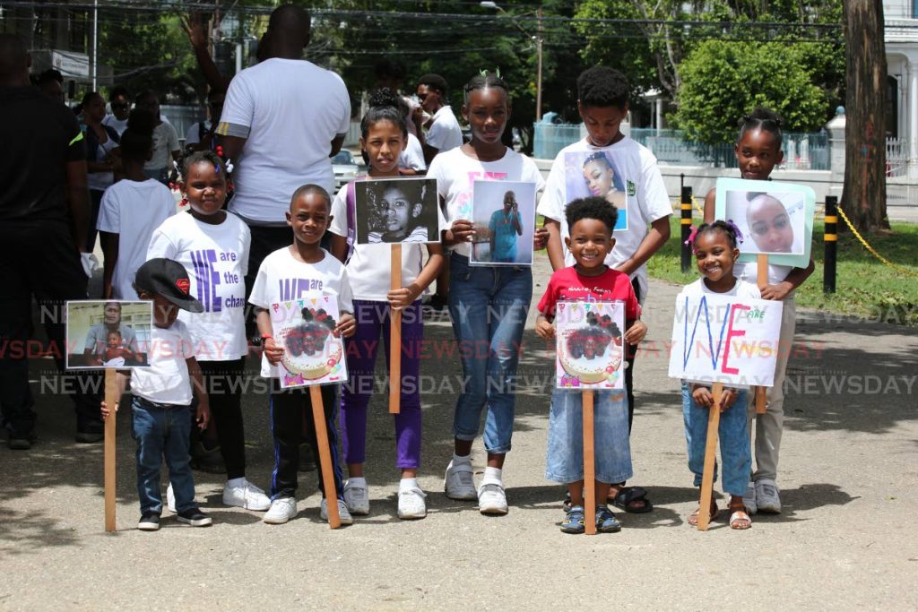 Children take part in an anti-crime rally in memory of young murder victims, including St Anthony's College student Akil Phillips who was killed in April, at Queen's Park Savannah, Port of Spain on Saturday. PHOTO BY SUREASH CHOLAI